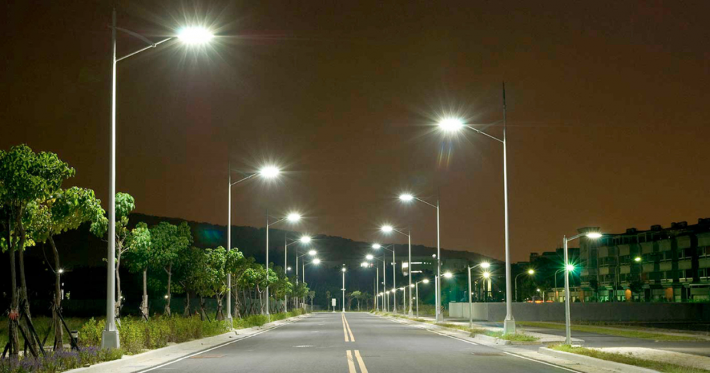 S3WAN smart streetlights illuminating a city boulevard at night
